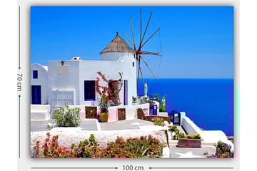 Canvastavla 70x100 cm - Pittoresk vy av en vitkalkad byggnad med en traditionell vindmölla och färgglada blommor i Santorini - Vit / Blå / Röd - Inredning - Tavlor & posters - Canvastavla