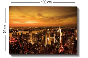 Canvastavla 70x100 cm - Panoramavy av en stad vid solnedgång med höga byggnader och en dramatisk himmel - Orange / Guld / Svart - Inredning - Tavlor & posters - Canvastavla