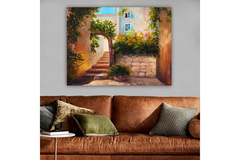 Canvastavla 70x100 cm - Pittoresk gränd med trappor omgiven av grönska och blommor, Grön / Beige / Orange