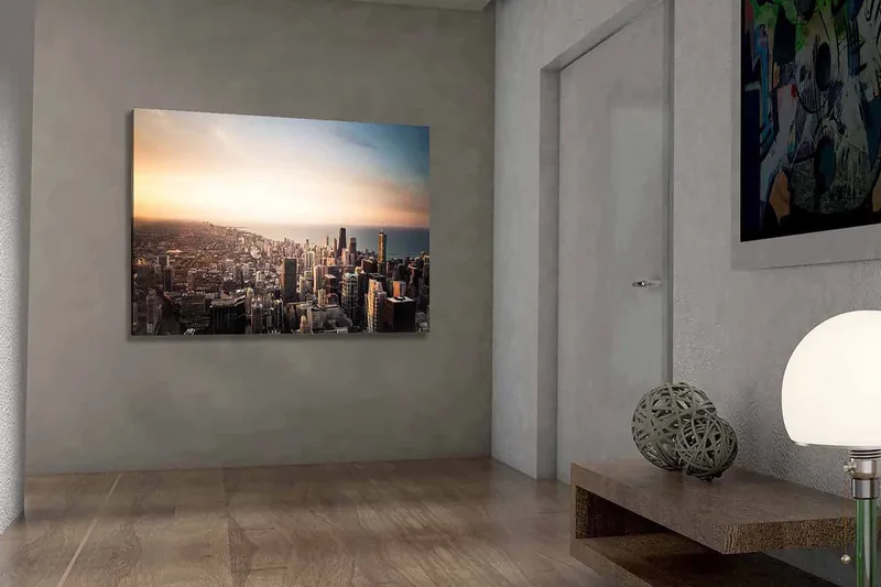 Canvastavla 70x100 cm - Panoramavy av en stad med höga skyskrapor och en solnedgång som skapar en dramatisk atmosfär - Blå / Orange / Grå - Inredning - Tavlor & posters - Canvastavla