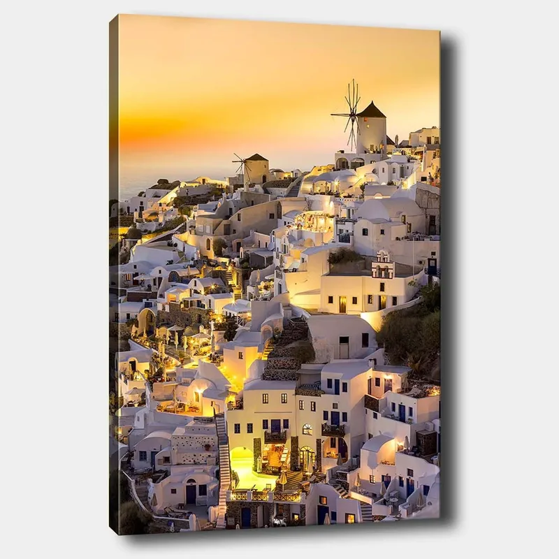 Canvastavla 70x100 cm - Pittoresk vy av Santorini med vita hus och en vindmölla i solnedgångens ljus, Vit / Gul / Orange