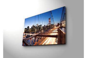 Canvastavla 70x45 cm - Stadssilhuett med bro och ljusspel vid skymning - Mörkblå / Orange / Svart - Inredning - Tavlor & posters - Canvastavla