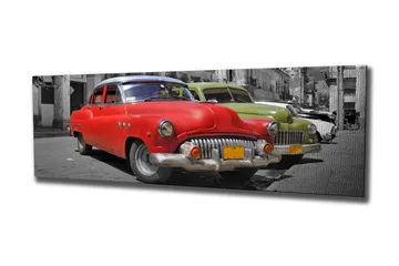 Canvastavla 80x30 cm - Röd vintagebil på en gata med en grön bil i bakgrunden - Röd / Grön / Grå - Inredning - Tavlor & posters - Canvastavla