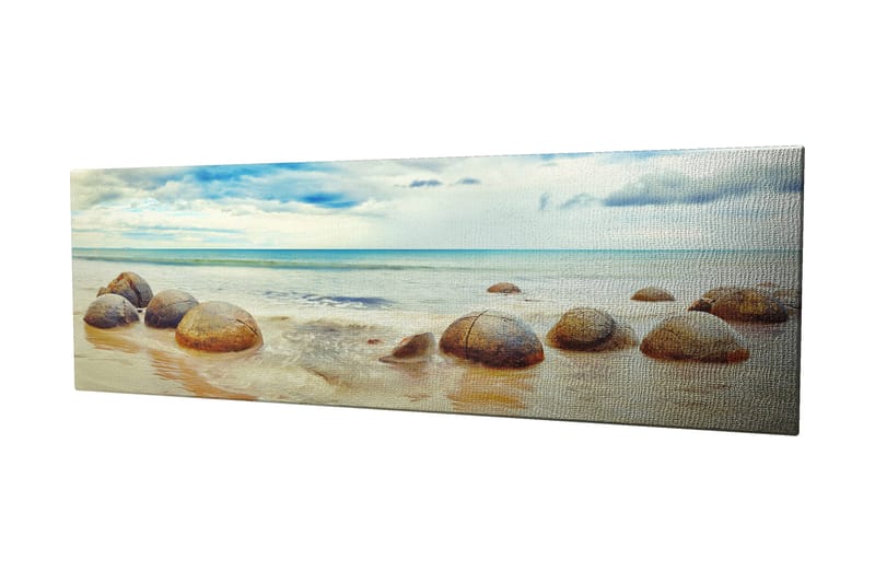 Canvastavla 80x30 cm - Runda stenar vid en strand med hav och himmel i bakgrunden - Blå / Beige / Grå - Inredning - Tavlor & posters - Canvastavla