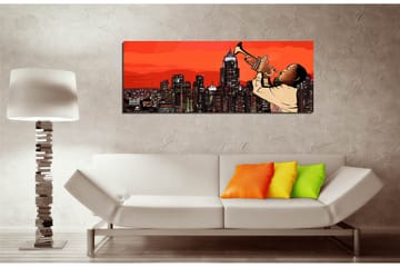 Canvastavla 80x30 cm - Spelande trumpetare mot en stadssilhuett i solnedgången - Röd / Svart / Beige - Inredning - Tavlor & posters - Canvastavla