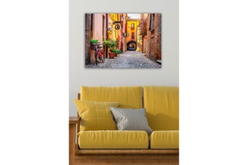 Canvastavla - Charmig gata med cykel och färgglada byggnader - Orange / Grön / Röd - Inredning - Tavlor & posters - Canvastavla