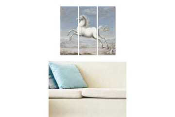 Canvastavla i trä 3-delar 50x70 cm - Vit häst i språng mot en ljusblå himmel - Vit / Ljusblå / Beige - Inredning - Tavlor & posters - Canvastavla