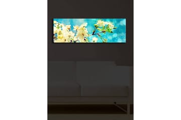 Canvastavla med LED-belysning 30x90 cm - Blommande körsbärsgrenar mot en ljusblå bakgrund - Vit / Ljusblå / Grön - Inredning - Tavlor & posters - Canvastavla