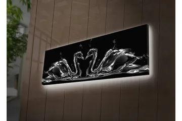 Canvastavla med LED-belysning 30x90 cm - Eleganta svanar i vattenrörelse - Svart / Vitt / Grått - Inredning - Tavlor & posters - Canvastavla