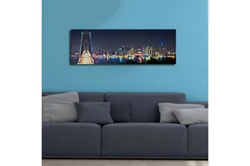 Canvastavla med LED-belysning 30x90 cm - Nattlig stadsbild med en bro och silhuetter av skyskrapor - Mörkblå / Ljusgrön / Vit - Inredning - Tavlor & posters - Canvastavla