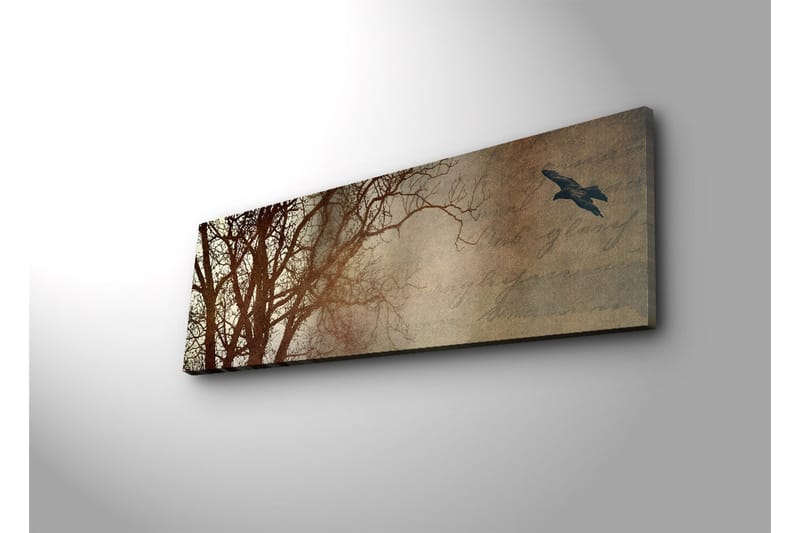 Canvastavla med LED-belysning 30x90 cm - Silhuett av träd med en fågel i flykt mot en mjukt tonad bakgrund - Mörkbrun / Beige / Svart - Inredning - Tavlor & posters - Canvastavla