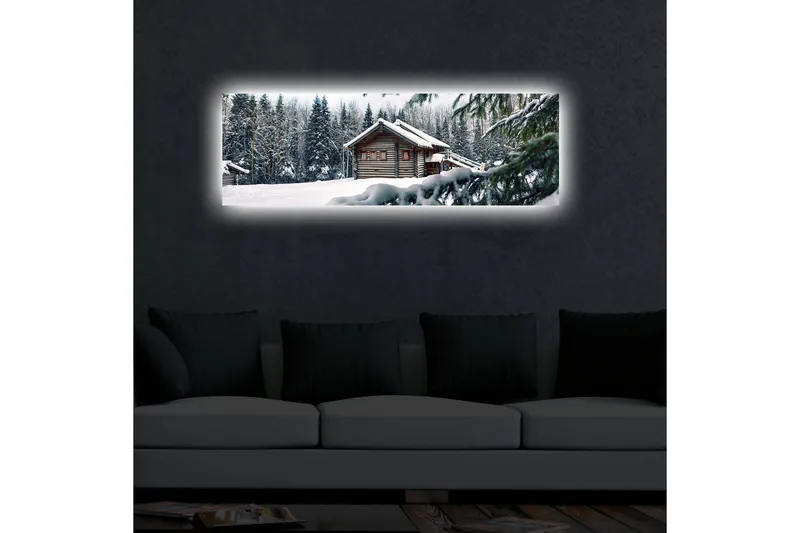 Canvastavla med LED-belysning 30x90 cm - Vinterlandskap med en stuga omgiven av snö och granar - Vit / Grön / Brun - Inredning - Tavlor & posters - Canvastavla