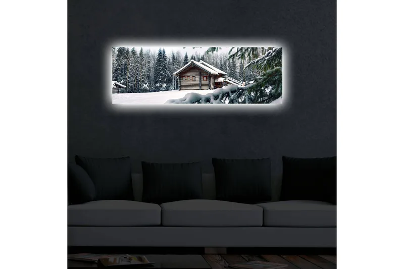 Canvastavla med LED-belysning 30x90 cm - Vinterlandskap med en stuga omgiven av snö och granar - Vit / Grön / Brun - Inredning - Tavlor & posters - Canvastavla