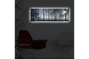 Canvastavla med LED-belysning 30x90 cm - Vinterlandskap med snöklädda träd och en svag solstråle - Blå / Vit / Grå - Inredning - Tavlor & posters - Canvastavla
