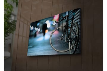 Canvastavla med LED-belysning 45x70 cm - Cykel i stadsmiljö med suddiga ljusreflexer - Svart / Blå / Grå - Inredning - Tavlor & posters - Canvastavla
