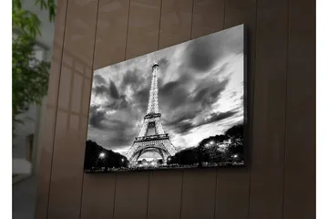 Canvastavla med LED-belysning 45x70 cm - Dramatisk fotobild över upptänt Eiffeltorn i Paris med molnhimmel i svartvit - Svart / Vit - Inredning - Tavlor & posters - Canvastavla