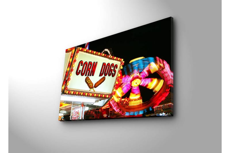 Canvastavla med LED-belysning 45x70 cm - Ljus och färgglad skylt med texten CORN DOGS och en snurrande karusell i bakgrunden - Röd / Gul / Blå - Inredning - Tavlor & posters - Canvastavla