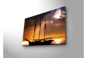 Canvastavla med LED-belysning 45x70 cm - Segelbåt mot en solnedgång över havet - Orange / Svart / Guld - Inredning - Tavlor & posters - Canvastavla
