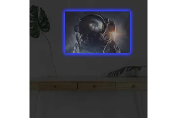 Canvastavla med LED-belysning - Astronaut med jorden synlig i hjälmen mot en stjärnklar bakgrund - Mörkblå / Svart / Vit - Inredning - Tavlor & posters - Canvastavla