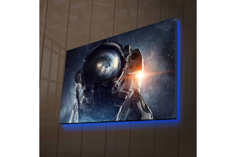 Canvastavla med LED-belysning - Astronaut med jorden synlig i hjälmen mot en stjärnklar bakgrund, Mörkblå / Svart / Vit