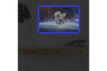 Canvastavla med LED-belysning - Astronaut som svävar i rymden över jorden - Vit / Blå / Svart - Inredning - Tavlor & posters - Canvastavla
