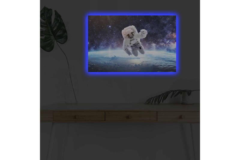 Canvastavla med LED-belysning - Astronaut som svävar i rymden över jorden - Vit / Blå / Svart - Inredning - Tavlor & posters - Canvastavla