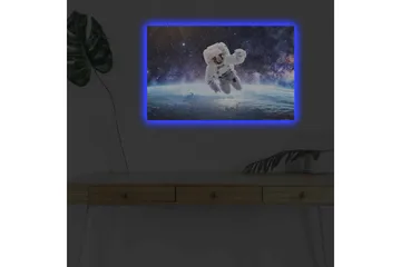 Canvastavla med LED-belysning - Astronaut som svävar i rymden över jorden - Vit / Blå / Svart - Inredning - Tavlor & posters - Canvastavla