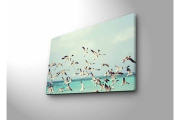 Canvastavla med LED-belysning - Flock av fåglar som flyger över en blå havsyta - Ljusblå / Vit / Svart - Inredning - Tavlor & posters - Canvastavla