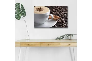 Canvastavla med LED-belysning - Kopp med kaffe och kanelstänger på en bakgrund av kaffebönor - Brun / Vit / Beige - Inredning - Tavlor & posters - Canvastavla