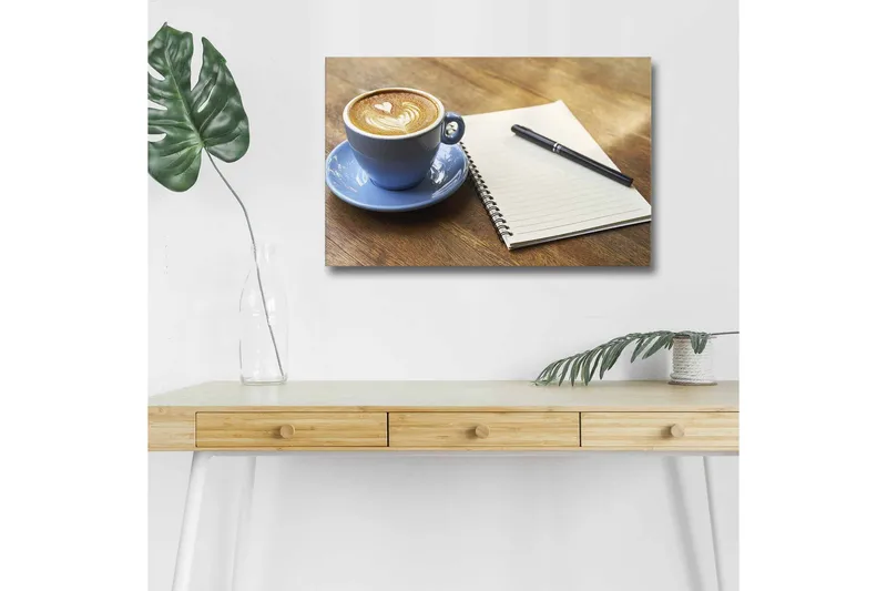Canvastavla med LED-belysning - Kopp med lattekonst på ett träbord tillsammans med en anteckningsbok och penna, Blå / Brun / Vit