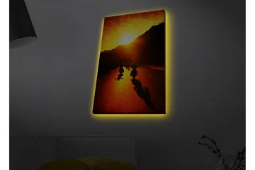 Canvastavla med LED-belysning - Motorcyklar som färdas längs en väg i solnedgångens gyllene ljus - Guld / Orange / Svart - Inredning - Tavlor & posters - Canvastavla