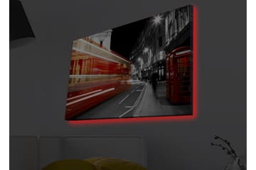Canvastavla med LED-belysning - Röd buss i rörelse på en svartvit stadsgata - Röd / Svart / Grå - Inredning - Tavlor & posters - Canvastavla
