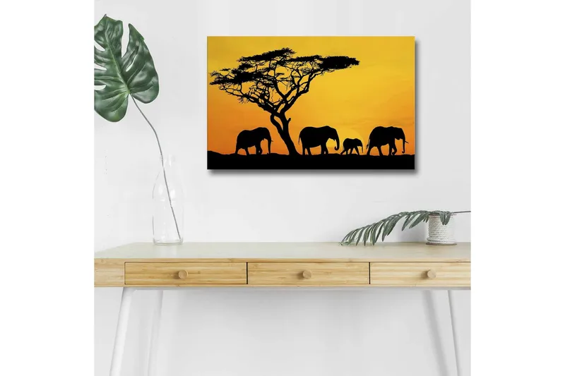 Canvastavla med LED-belysning - Silhuetter av elefanter under en solnedgång med ett träd i bakgrunden, Svart / Orange / Gul