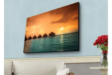 Canvastavla med LED-belysning - Solnedgång över en tropisk strand med övervattensbungalower - Orange / Turkos - Inredning - Tavlor & posters - Canvastavla