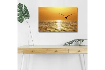 Canvastavla med LED-belysning - Solnedgång över havet med en fågel i flykt - Guld / Orange / Svart - Inredning - Tavlor & posters - Canvastavla