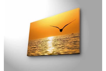 Canvastavla med LED-belysning - Solnedgång över havet med en fågel i flykt - Guld / Orange / Svart - Inredning - Tavlor & posters - Canvastavla