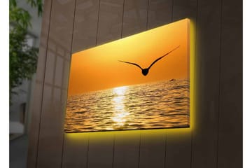 Canvastavla med LED-belysning - Solnedgång över havet med en fågel i flykt - Guld / Orange / Svart - Inredning - Tavlor & posters - Canvastavla
