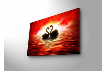 Canvastavla med LED-belysning - Två svanar som formar ett hjärta mot en dramatisk solnedgång - Röd / Svart / Orange - Inredning - Tavlor & posters - Canvastavla