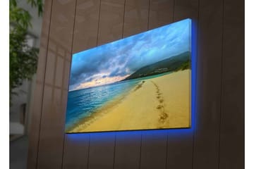 Canvastavla med LED-belysning - Vacker strand med fotspår i sanden och en dramatisk himmel - Blå / Sandgul / Grå - Inredning - Tavlor & posters - Canvastavla