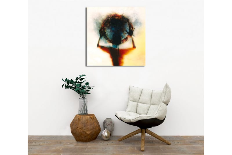 Canvastavla - Silhuett av en person som håller en cirkel av färg och ljus - Svart / Blå / Röd - Inredning - Tavlor & posters - Canvastavla