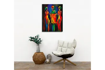 Canvastavla - Tre kvinnor i färgglada klänningar som håller ett tygstycke tillsammans - Röd / Gul / Grön - Inredning - Tavlor & posters - Canvastavla