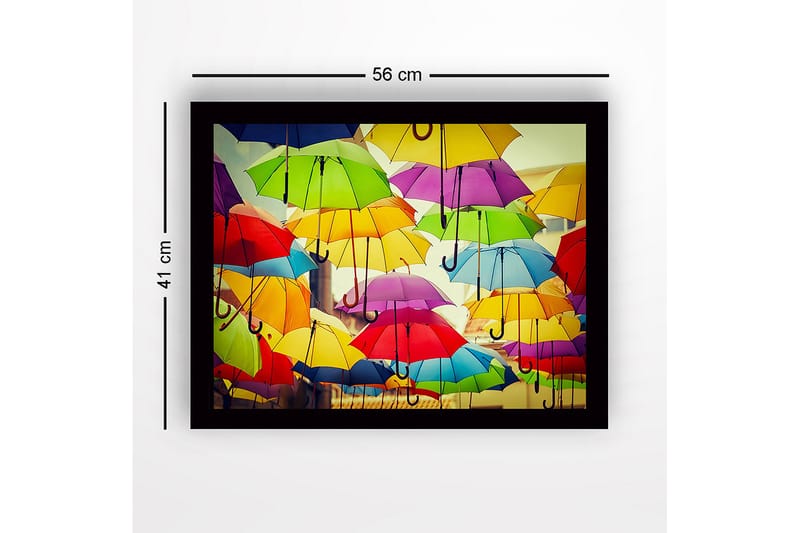 Inramad Canvastavla i trä - 41x56 cm - Färgglada paraplyer som svävar över en stadsmiljö - Gul / Grön / Röd - Inredning - Tavlor & posters - Canvastavla