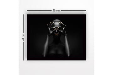 Inramad Canvastavla i trä - 41x56 cm - Mörk silhuett av en kvinna med guldiga detaljer som formar en mask - Svart / Guld - Inredning - Tavlor & posters - Canvastavla