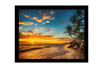 Inramad Canvastavla i trä - 41x56 cm - Solnedgång över en strand med palmer och vågor - Orange / Blå / Grön - Inredning - Tavlor & posters - Canvastavla