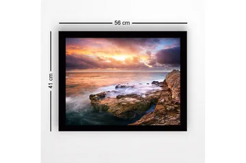 Inramad Canvastavla i trä - 41x56 cm - Storslagen solnedgång över havet med klippformationer i förgrunden - Orange / Blå / Grå - Inredning - Tavlor & posters - Canvastavla