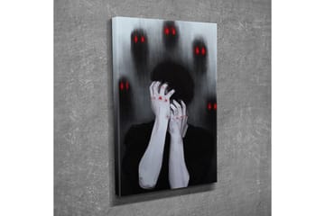 Liten Canvastavla 30x40 cm - Mörk och känslosam skildring av en person som håller huvudet i händerna, omgiven av skugglika figurer med röda ögon - Svart / Grå / Röd - Inredning - Tavlor & posters - Canvastavla