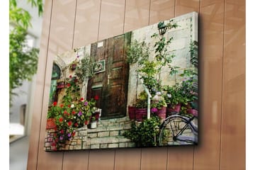 Stor Canvastavla 100x70 cm - Vacker dörr omgiven av färgglada blommor och grönska - Röd / Grön / Lila - Inredning - Tavlor & posters - Canvastavla