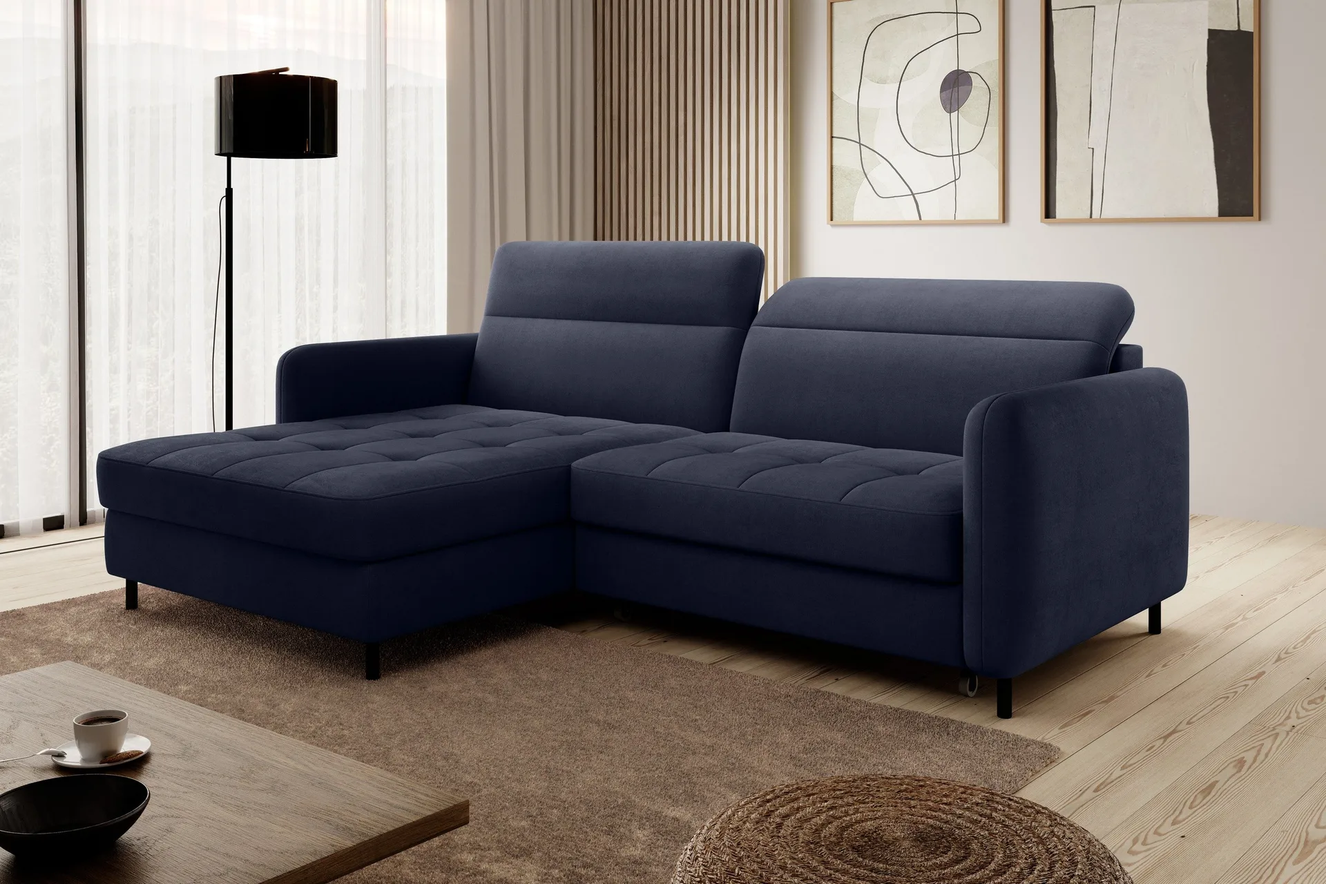 Blå bäddsoffa med divan och förvaring under sitsen