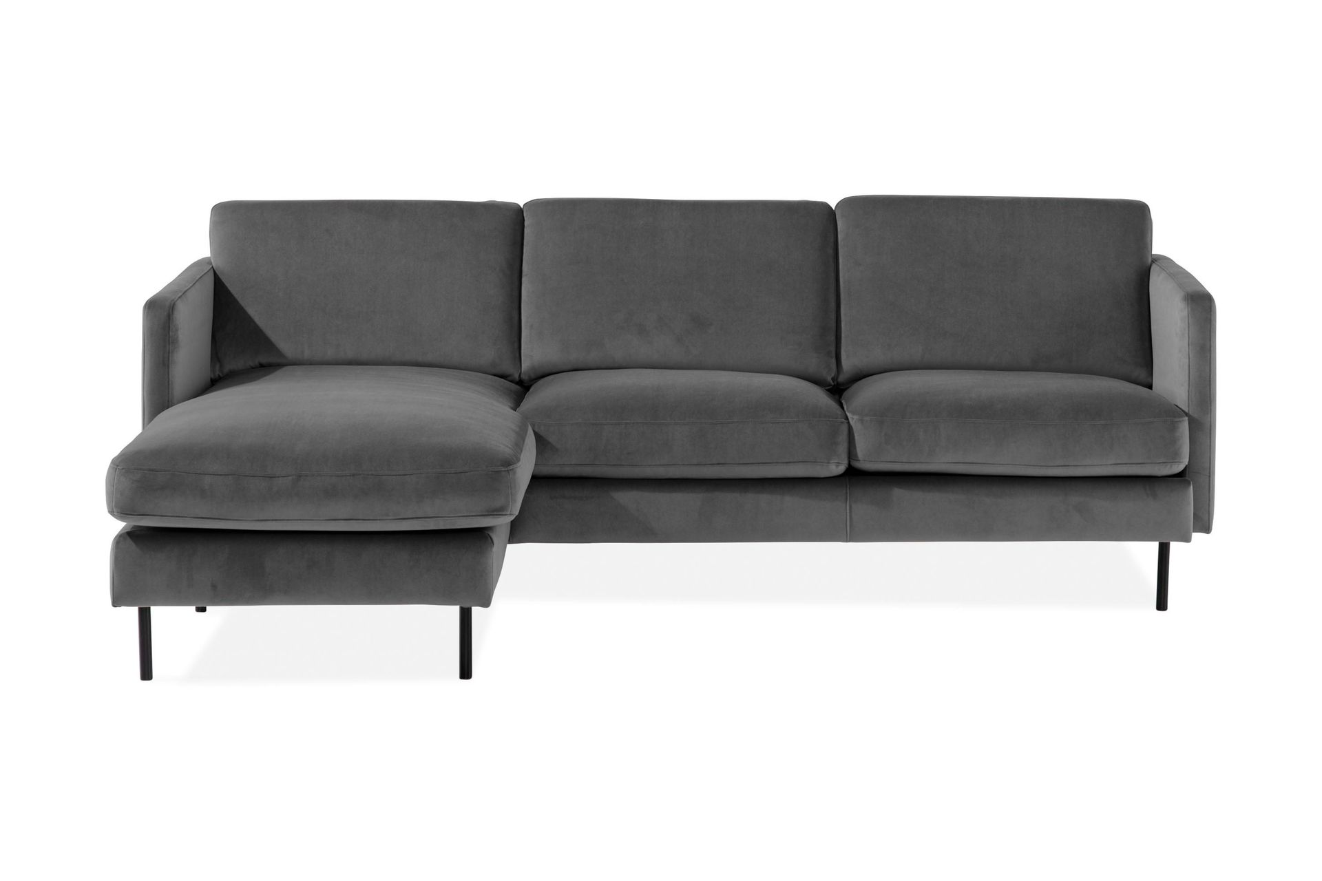 Ljusgrå sammetssoffa i tvåsits med vänstervänd divan